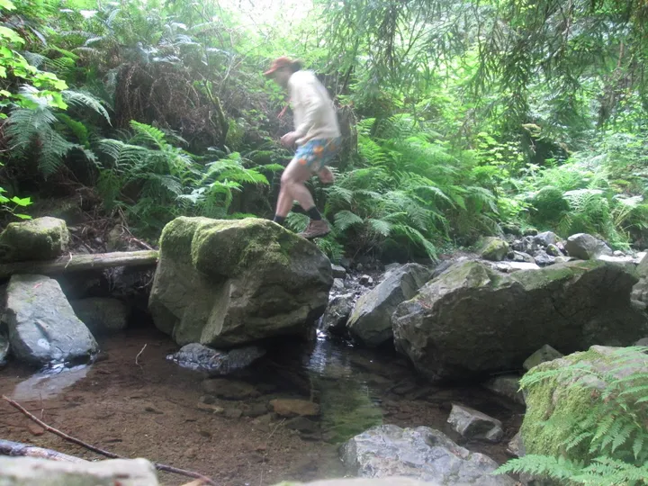 Spencer Jumping on Rocks