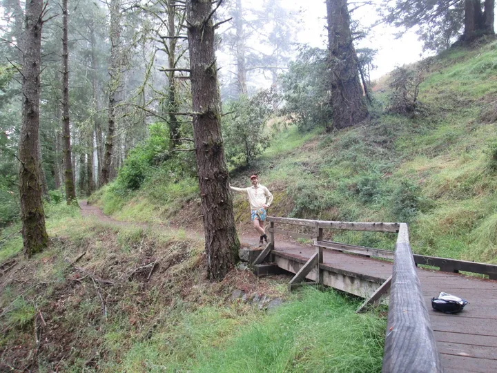 Spencer at the end of a bridge