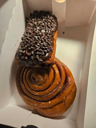 Cinnamon roll and chocolate-filled donut