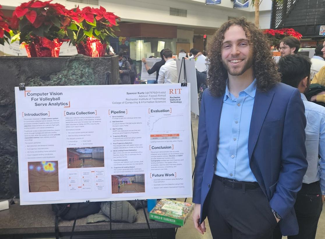 Spencer in front of his Master's project poster